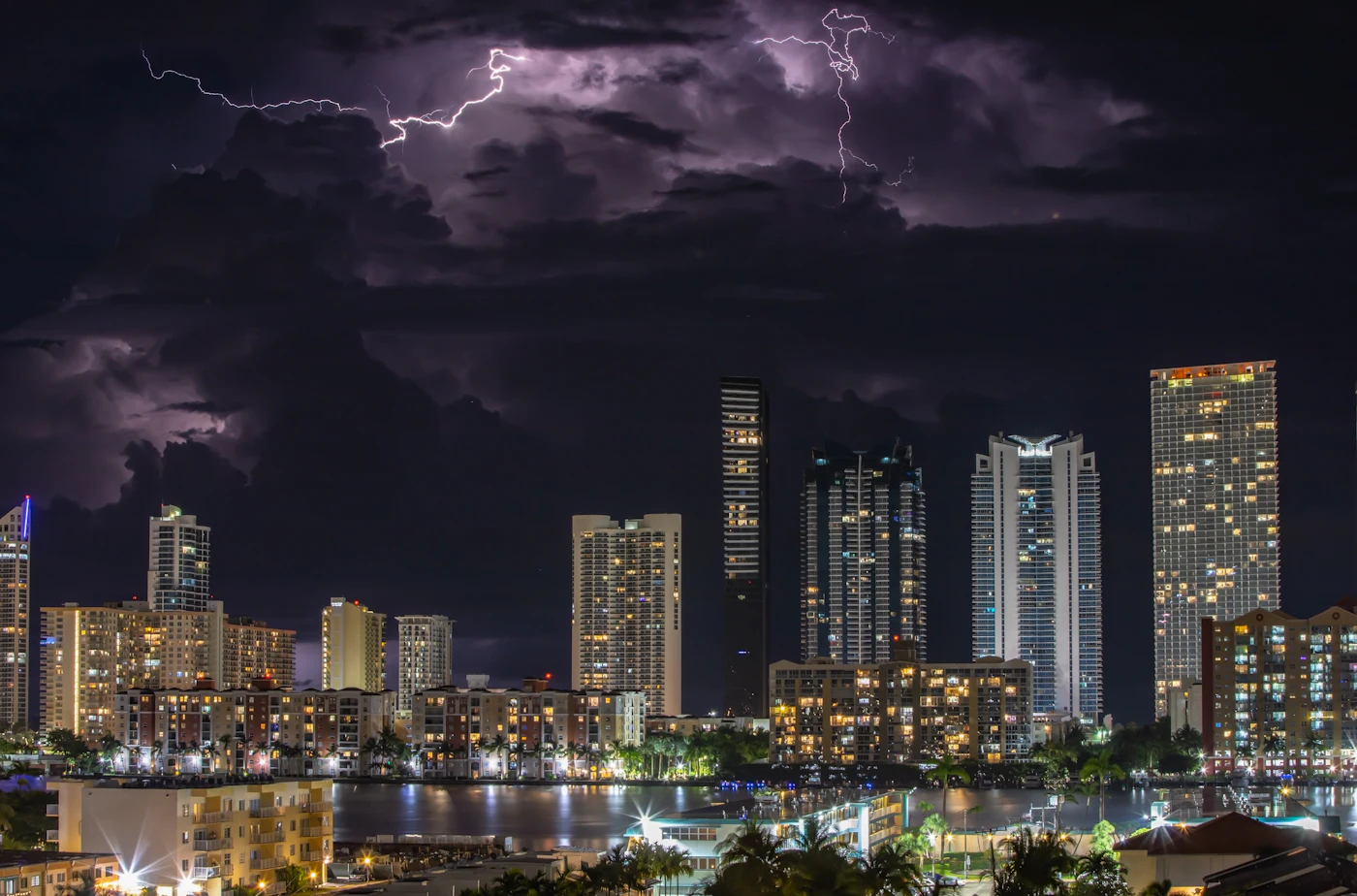 Lightning over condo towers in Sunny Isles Beach, Miami, during a night thunderstorm